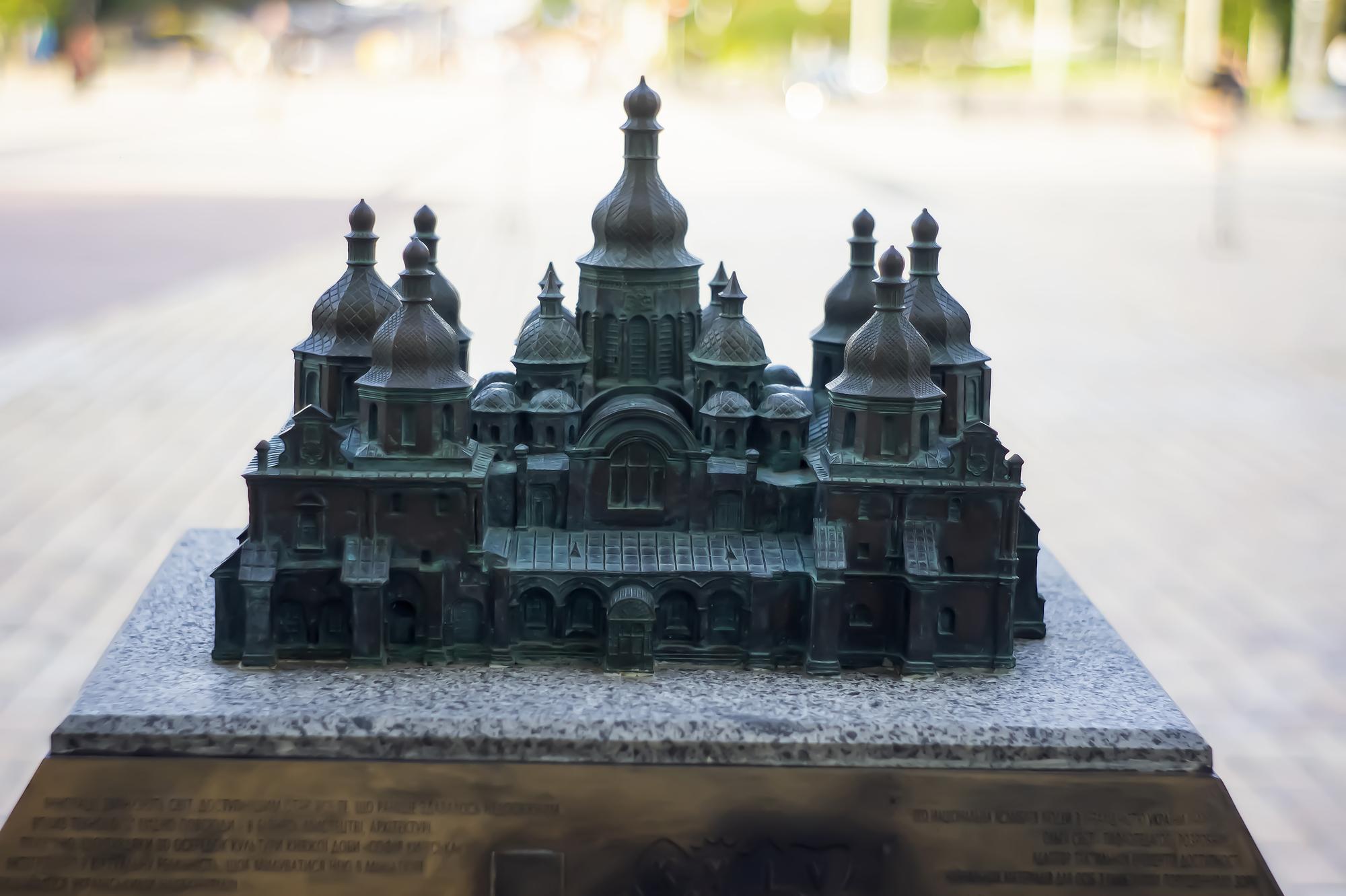 Exterior sculptures, reliefs, and their symbolic meanings visible on the facade