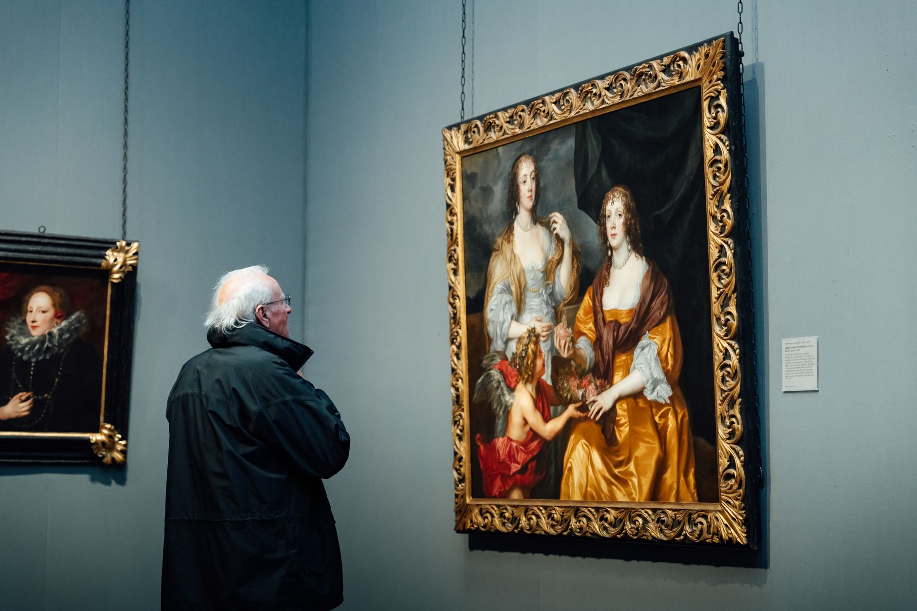 senior woman museum painting