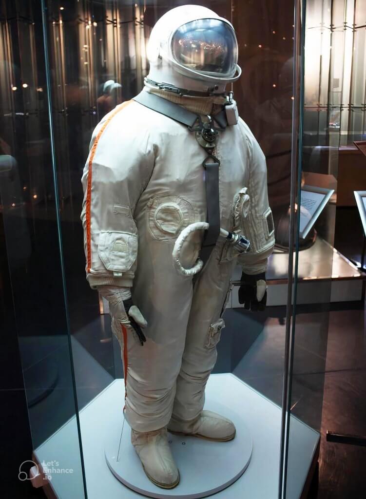 A vintage Soviet-era Berkut spacesuit displayed in a glass case at the Kosmo Museum in Moscow.